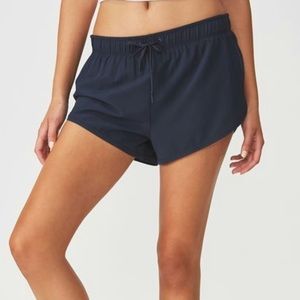 Navy blue running shorts with built in spandex